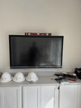 Commercial TV install, leveled before the hard hats come off.